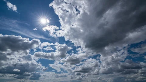 Blue sky white clouds. Puffy fluffy white clouds. Cumulus cloud cloudscape Stock Footage 197743173