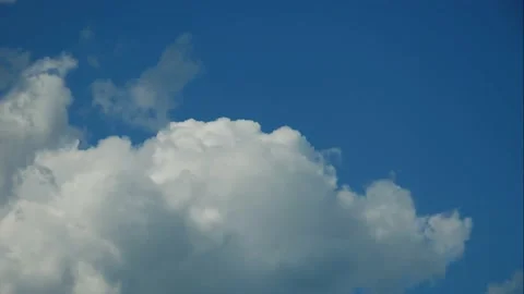 Blue sky white clouds. Puffy fluffy white clouds. Cumulus cloud scape timelapse Stock Footage 201006484