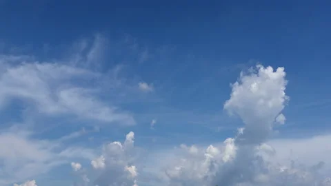 Blue sky white clouds. Puffy fluffy white clouds. Cumulus cloud cloudscape 스톡 동영상 202113597