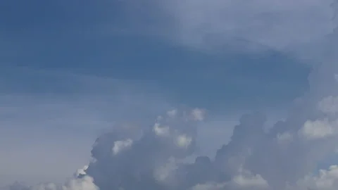 Blue sky white clouds. Puffy fluffy white clouds. Cumulus cloud cloudscape ti Stock Footage 202160403