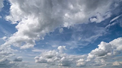 Blue sky white clouds. Puffy fluffy white clouds. Cumulus cloud cloudscape Stock Footage 223948653