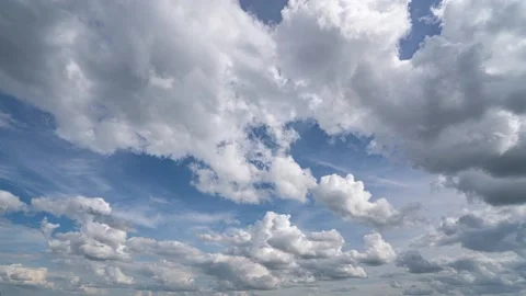 Blue sky white clouds. Puffy fluffy white clouds. Cumulus cloud cloudscape Stock Footage 228700595