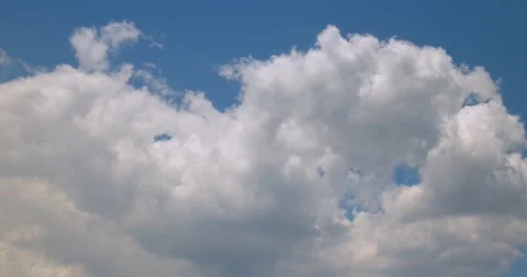 Blue sky white clouds. Puffy fluffy white clouds. Cumulus cloud cloudscape Stock Footage 245907522
