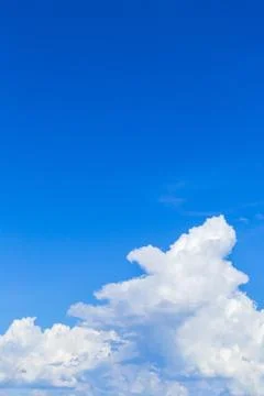 Blue sky with white clouds, rain clouds on sunny summer or spring day. 스톡 사진