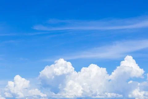 Blue sky with white clouds, rain clouds on sunny summer or spring day. 스톡 사진