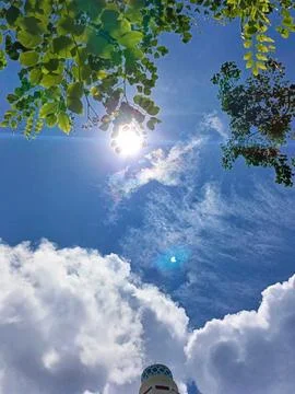 Blue sky with white clouds. The sky is clear and bright, and the clouds are scat Foto stock