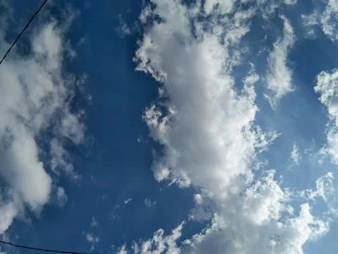 Blue sky with white clouds suitable for wallpaper or background Stock Photos