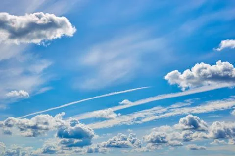 Blue sky with white clouds on a summer day Stock Photos