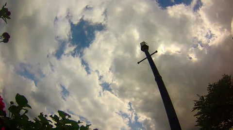 Blue Sky, White Clouds, Sun, Lamp Post Time Lapse Stock Footage 33647702