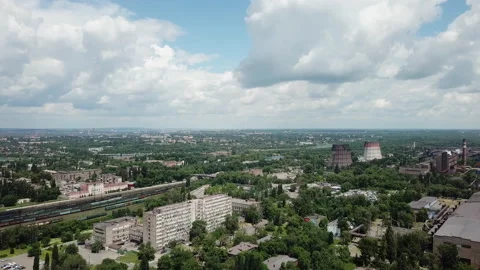 Blue sky with white clouds A sunny summer day over an industrial city. Stock Footage 196397621
