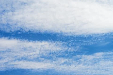 Blue sky with white clouds in sunny day. Beauty clear cloudy sky in sunshin.. Stock Photos