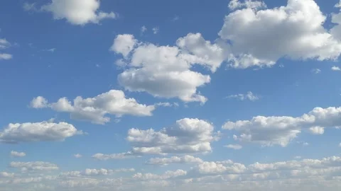 Blue sky white clouds time lapse. Clouds are moving in the blue sky Stock Footage 154630151