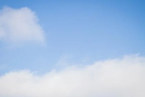 Blue sky with white clouds in the winter air Stock Photos