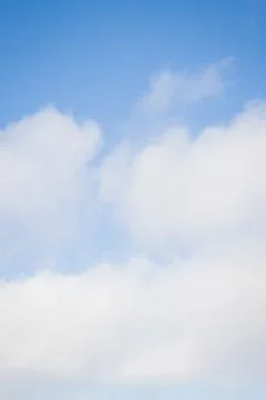 Blue sky with white clouds in the winter air Stock Photos
