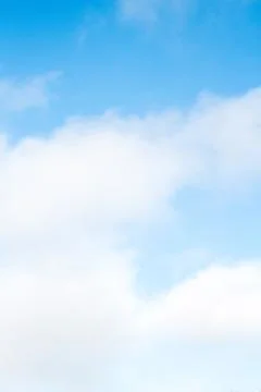 Blue sky with white clouds in the winter air Stock Photos