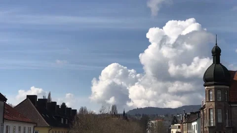 Blue sky, white clouds.Soft white clouds form over the city. Stock Footage 152384686