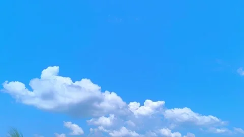 Blue Sky With White Cumulus Clouds On A Bright Sunny Day Stock Footage 345315826