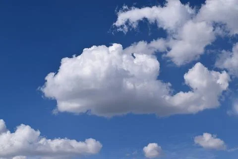 Blue sky with white cumulus clouds Stock Photos