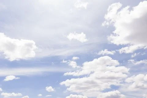 Blue sky with white cumulus clouds on a sunny day 스톡 사진