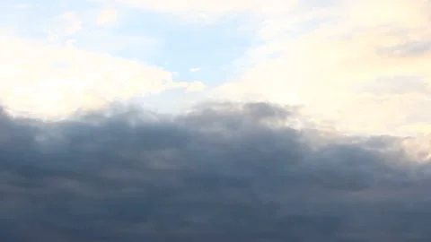 Blue sky white fluffy clouds slowly floating Stock Footage 131954851