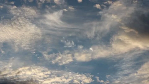Blue sky white fluffy clouds slowly floating Stock Footage 131955281
