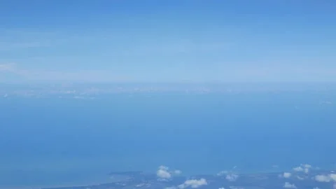 Blue sky with white fluffy clouds from airplane flight fly over the clouds .. Stock Footage 249666037