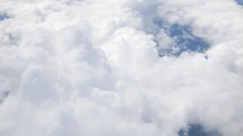 Blue sky with white fluffy clouds fromm airplane flight fly over the clouds.. Stock Footage 273251521
