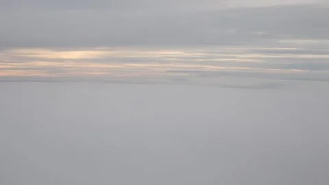 Blue sky with white fluffy clouds from airplane flight fly over the clouds .. Stock Footage 284210416