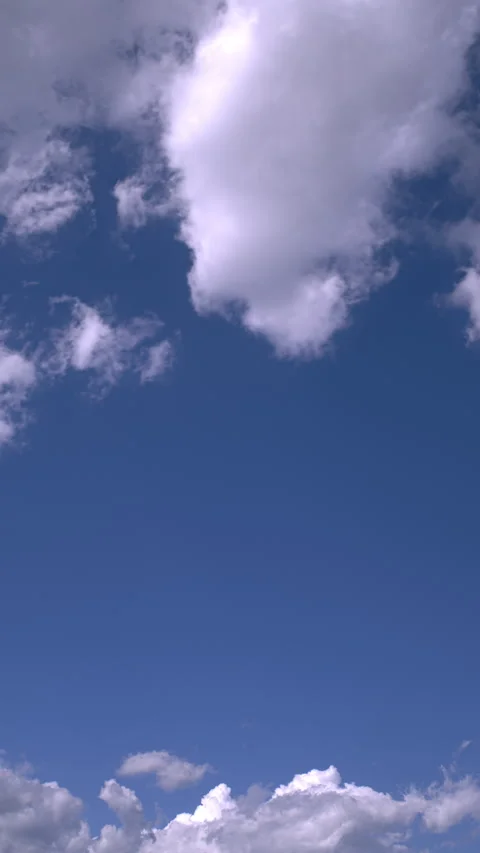 Blue Sky with White Fluffy Clouds Moving (Vertical | Time Lapse | Static) Video stock 341712532