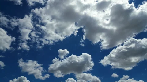 Blue sky with white fluffy clouds natural background Stock Footage 341858623