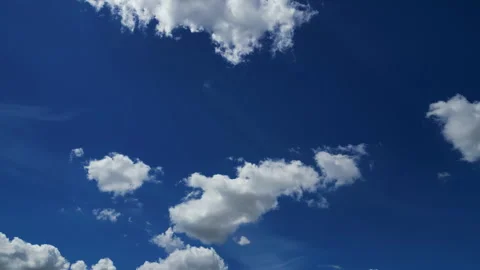 Blue sky with white fluffy clouds natural background Stock Footage 341859547