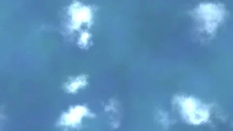 Blue sky with white fluffy clouds drifting seamless loop animation Video stock 347076755