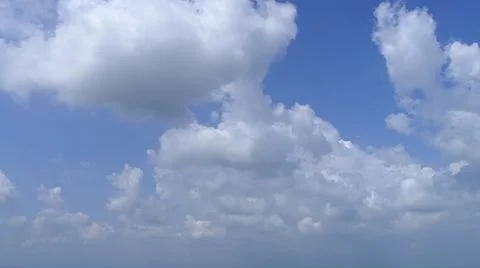 Blue Sky with White Fluffy Clouds Foto stock