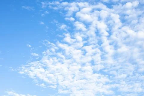 Blue Sky with White Fluffy Clouds Stock Photos