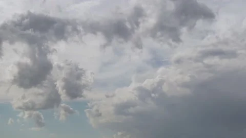 Blue Sky with White Gray Clouds in the Background. The Sky Is Overcast. Sky with Stock Footage 138366476