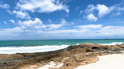 Blue sky, white sand beach, clear sea in summer season Stock Footage 193985998
