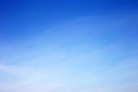 Blue sky with white, soft clouds Stock Photos