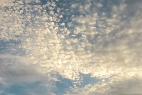 Blue sky with white soft clouds, natural background Stock Photos