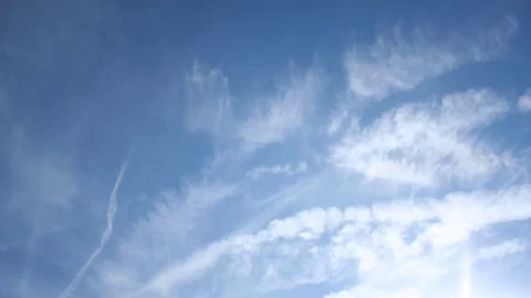 Blue sky with white wispy clouds Stock Footage 98678064