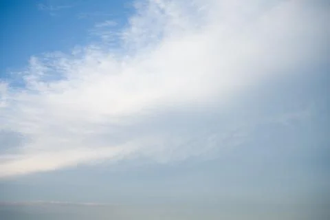 Blue Sky with Wispy Clouds Stock Photos