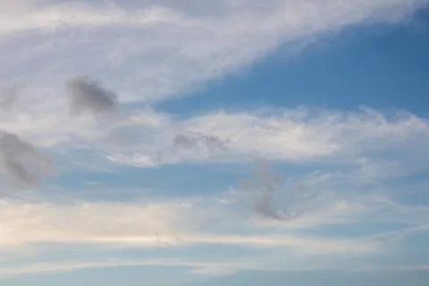 Blue Sky With Wispy Clouds Stock Photos
