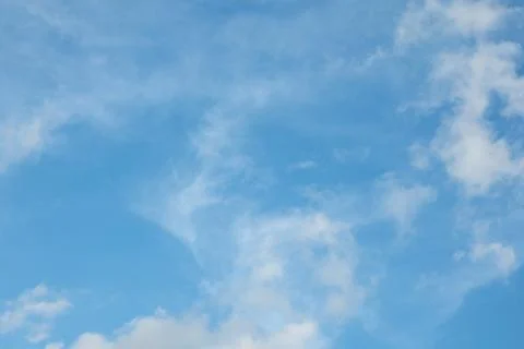 Blue Sky With Wispy Clouds Stock Photos