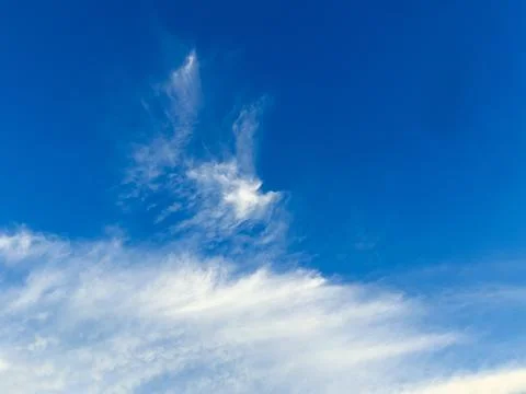 Blue Sky with Wispy White Clouds 스톡 사진