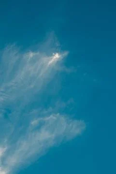 Blue Sky with Wispy White Clouds Fotos de archivo