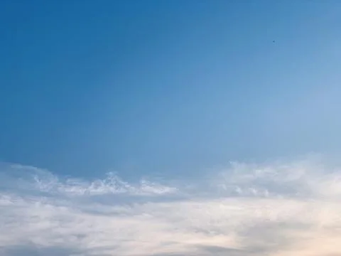 Blue Sky with Wispy White Clouds Natural Background in Jakarta Stock Photos