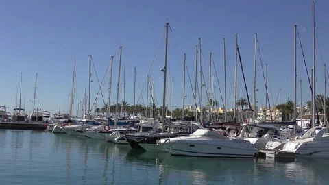 Blue sky yachts harbour movement Stock Footage 72408377