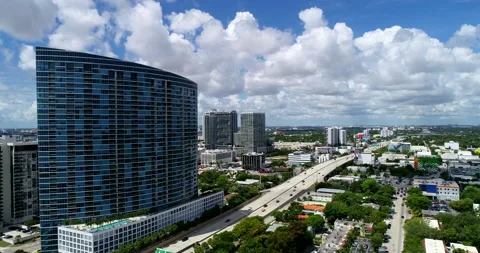 Blue skyscraper on Biscayne Bay Stock Footage 206257990