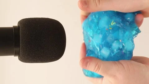 Blue slime with pieces of cubes. Slime ASMR video. Vídeos de archivo 323864310