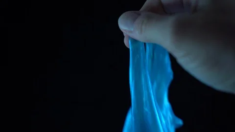 Blue slime in playing in hand Video stock 127224441