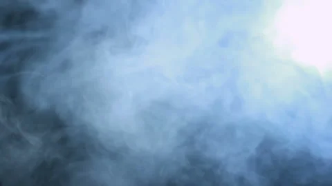 Blue smoke clouds drifting dark background. Swirling fog haze overlay backdrop. Stock Footage 345682145